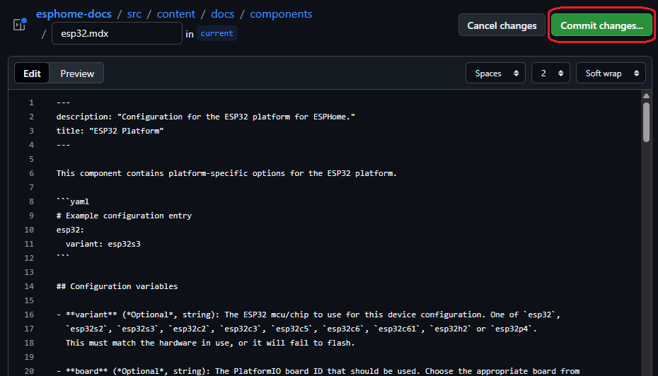 The GitHub file editor with the "Commit changes..." button circled